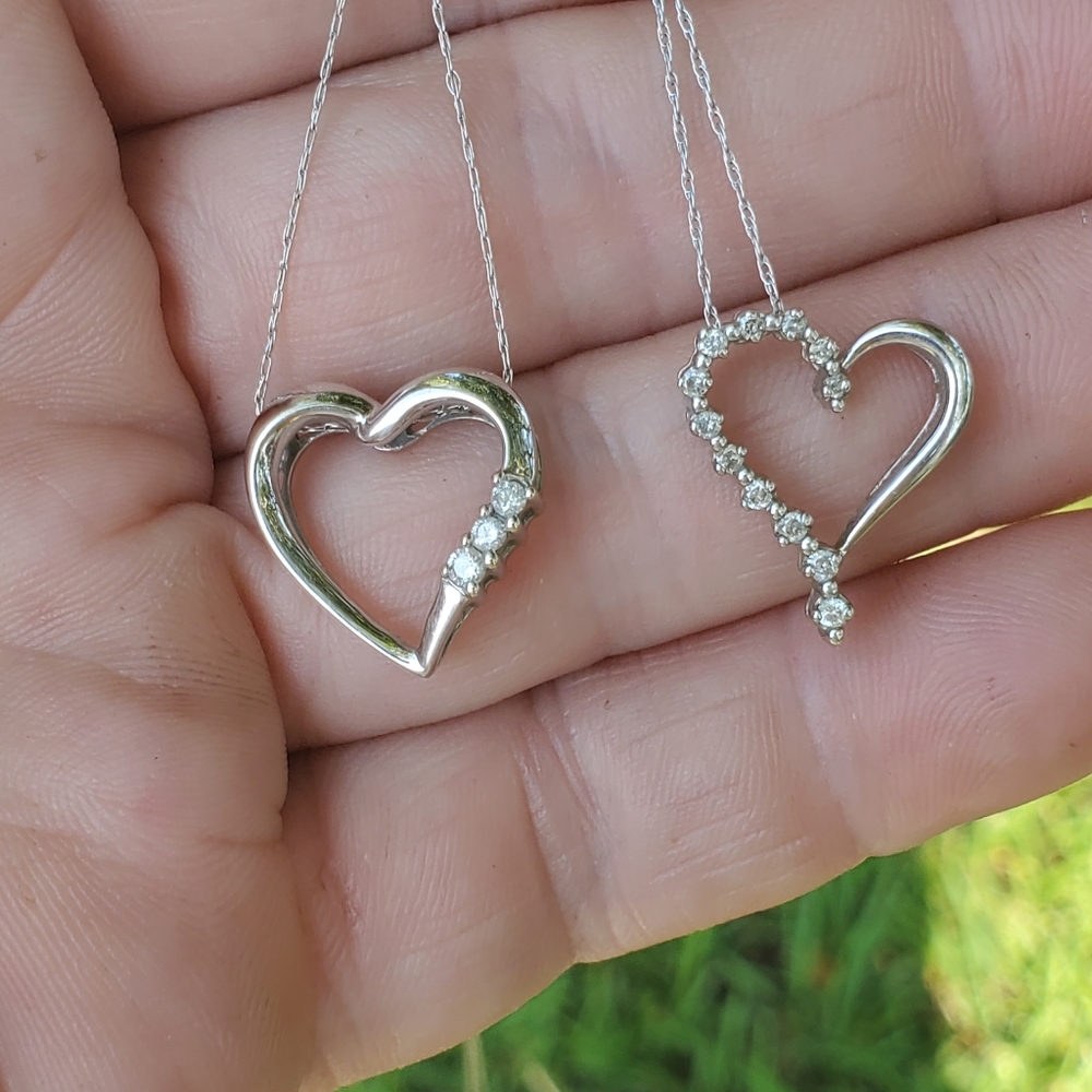 Two 10k gold diamond heart necklaces